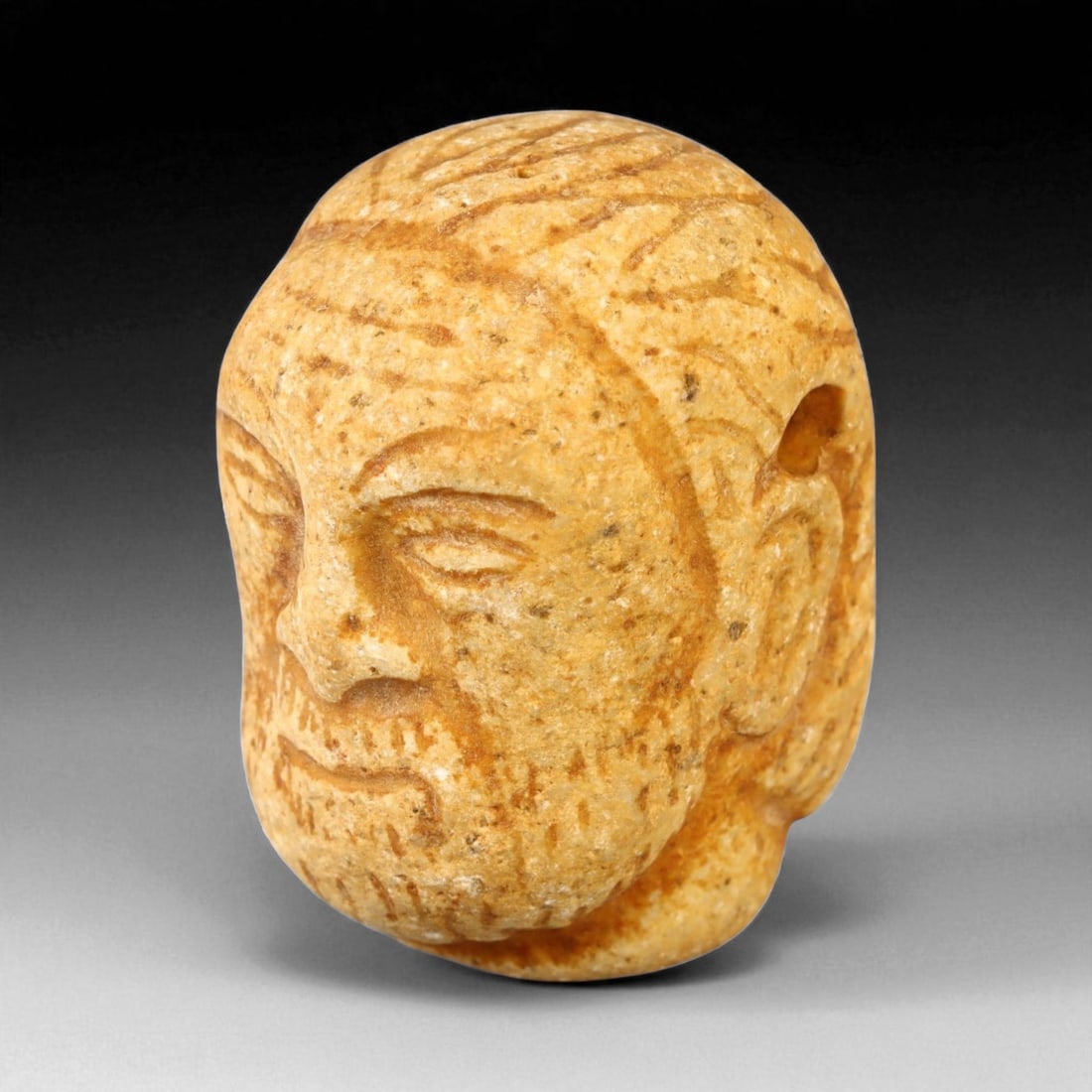 Ancient Medieval European Romanesque Carved Stone Head Pendant, c. 11th-13th Century CE, 4cm (1 of 3)