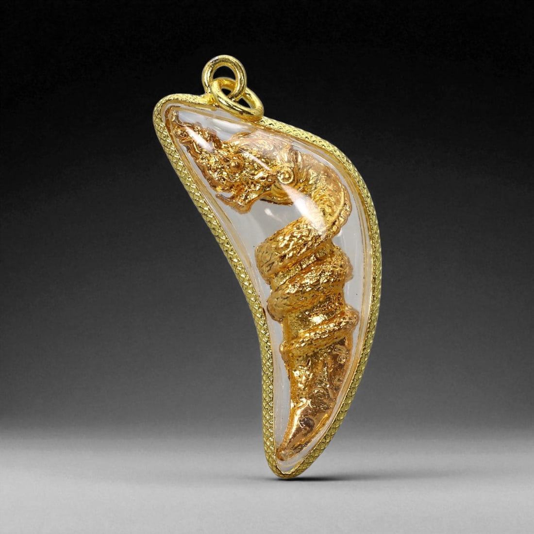 Thai Temple Gilt Buddhist Amulet in Ornate Gold-Tone Frame, 5cm: This beautifully crafted gilt Buddhist amulet is enclosed within an intricately designed gold-tone frame, combining sacred symbolism with refined artistry. The detailed relief and lustrous finish refl