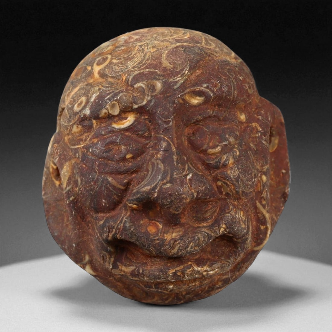 Ancient Sino-Mongolian Fossilized Stone Head Amulet, c. 5th-7th Century CE, 3.1cm (1 of 3)
