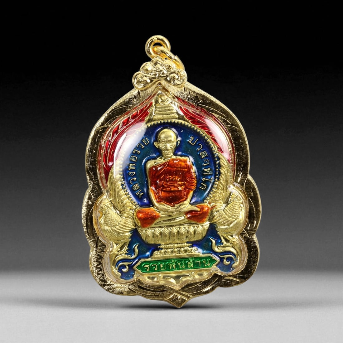 Thai Temple Style Gilt Buddhist Amulet in Ornate Gold-Tone Frame, 5.2cm: This beautifully crafted gilt Buddhist amulet is enclosed within an intricately designed gold-tone frame, combining sacred symbolism with refined artistry. The detailed relief and lustrous finish refl
