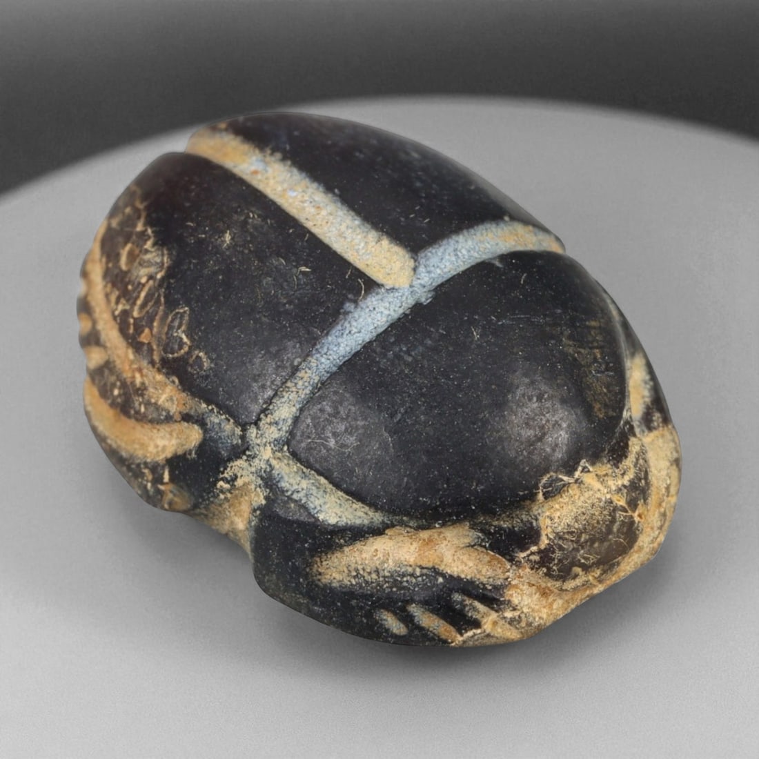 Ancient Egyptian Black Stone Scarab Amulet, c. 19th-18th Dynasty, 1550-1250 BCE, 2.1cm: This finely carved black stone scarab amulet dates to the height of New Kingdom Egypt, between the 19th and 18th Dynasties (circa 1550-1250 BCE). The scarab beetle, symbolizing Khepri-the solar deity 