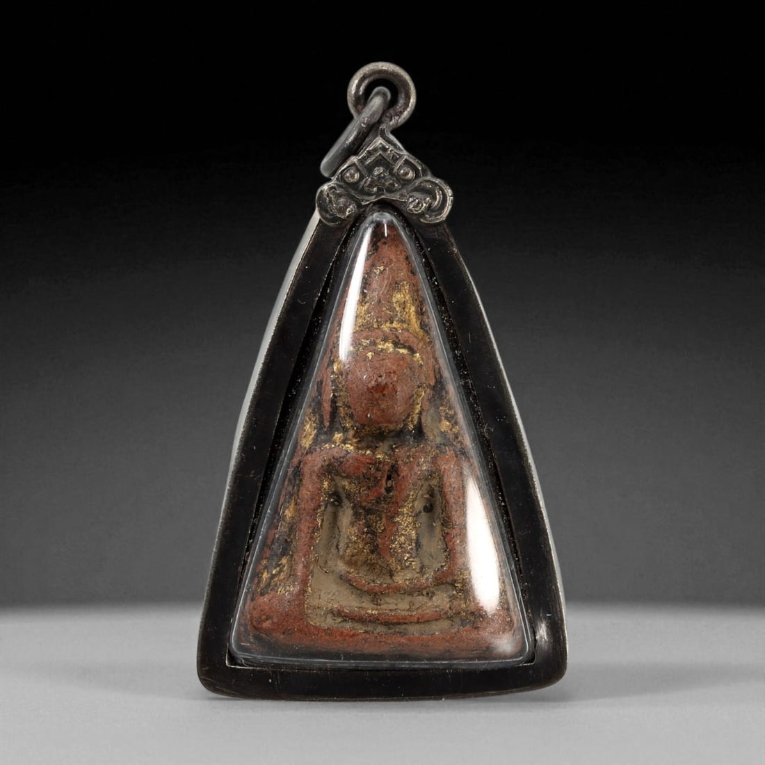 Vintage Thai Buddhist Amulet in Ornate Framed Setting, 20th Century , 5cm: This vintage Thai Buddhist amulet exemplifies the devotional artistry that continues to define Thailand's sacred craftsmanship. Encased within an intricately detailed frame, the amulet displays refine