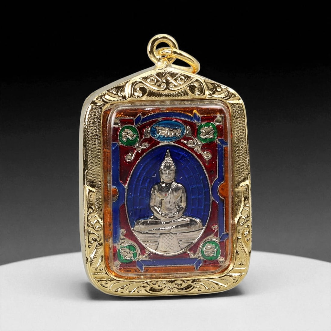 Thai Temple Style Gilt Buddhist Amulet in Ornate Gold-Tone Frame, 4.4cm: This beautifully crafted gilt Buddhist amulet is enclosed within an intricately designed gold-tone frame, combining sacred symbolism with refined artistry. The detailed relief and lustrous finish refl
