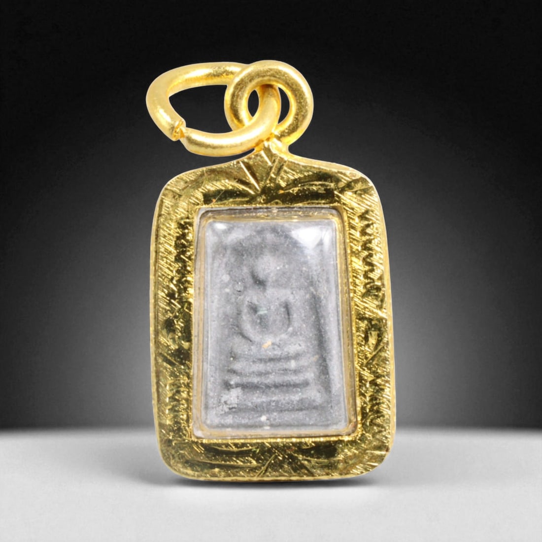 Thai Somdej Buddha Rectangular Amulet in Gilt Frame with Double Relief, Modern Era, 2g: This minimalist Thai Buddhist amulet features a classic Somdej Buddha image in low relief on one side, revered for its association with enlightenment, serenity, and supreme spiritual attainment. The o