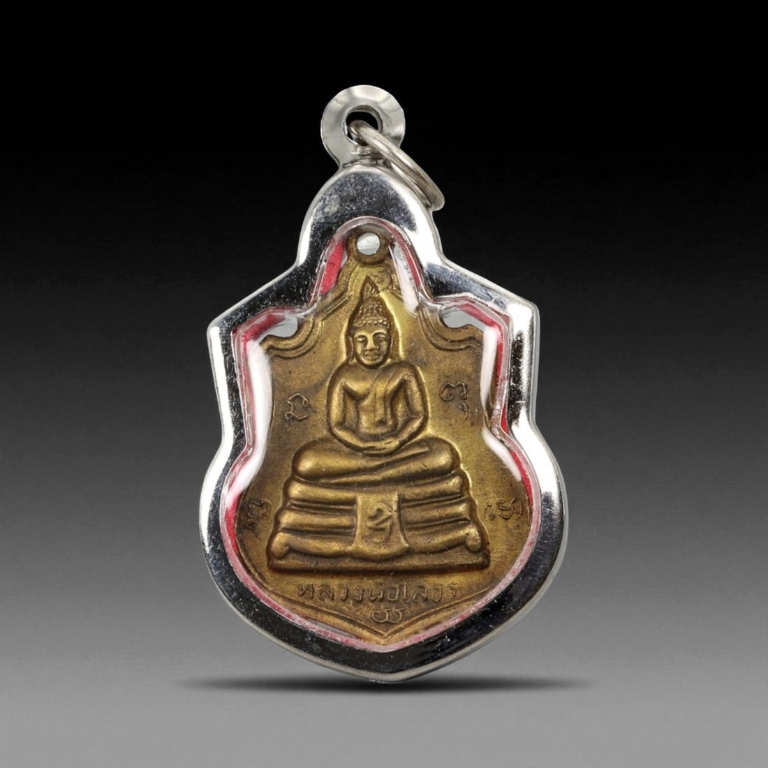 Vintage Thai Buddhist Amulet in Ornate Framed Setting, 20th Century, 5cm: This vintage Thai Buddhist amulet exemplifies the devotional artistry that continues to define Thailand's sacred craftsmanship. Encased within an intricately detailed frame, the amulet displays refine