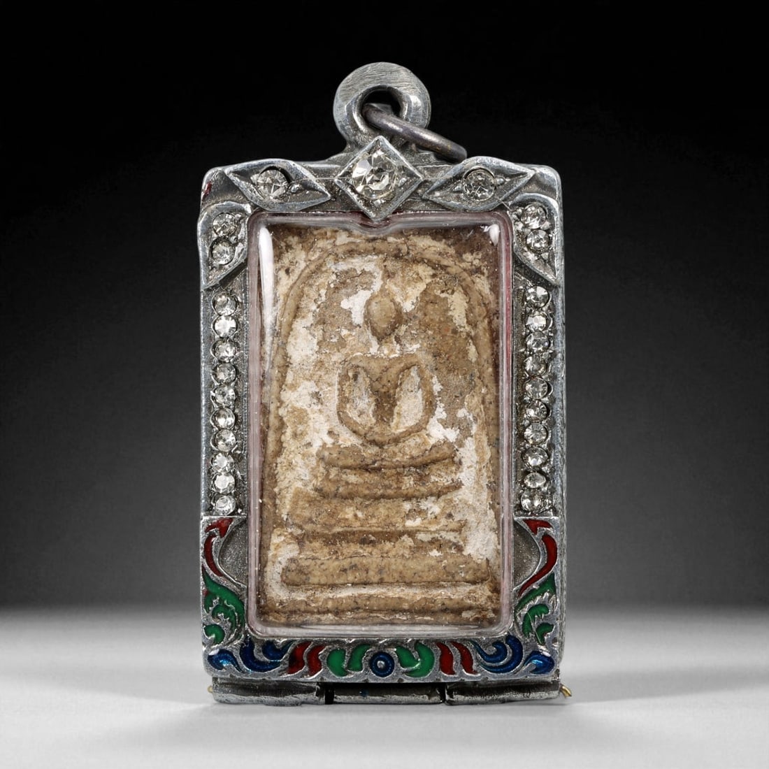 Vintage Thai Buddhist Amulet in Ornate Framed Setting, 20th Century, 6cm: This vintage Thai Buddhist amulet exemplifies the devotional artistry that continues to define Thailand's sacred craftsmanship. Encased within an intricately detailed frame, the amulet displays refine