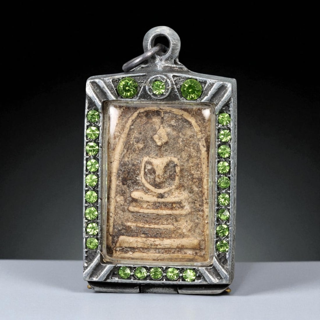 Vintage Thai Buddhist Amulet in Ornate Framed Setting, 20th Century, 6cm: This vintage Thai Buddhist amulet exemplifies the devotional artistry that continues to define Thailand's sacred craftsmanship. Encased within an intricately detailed frame, the amulet displays refine