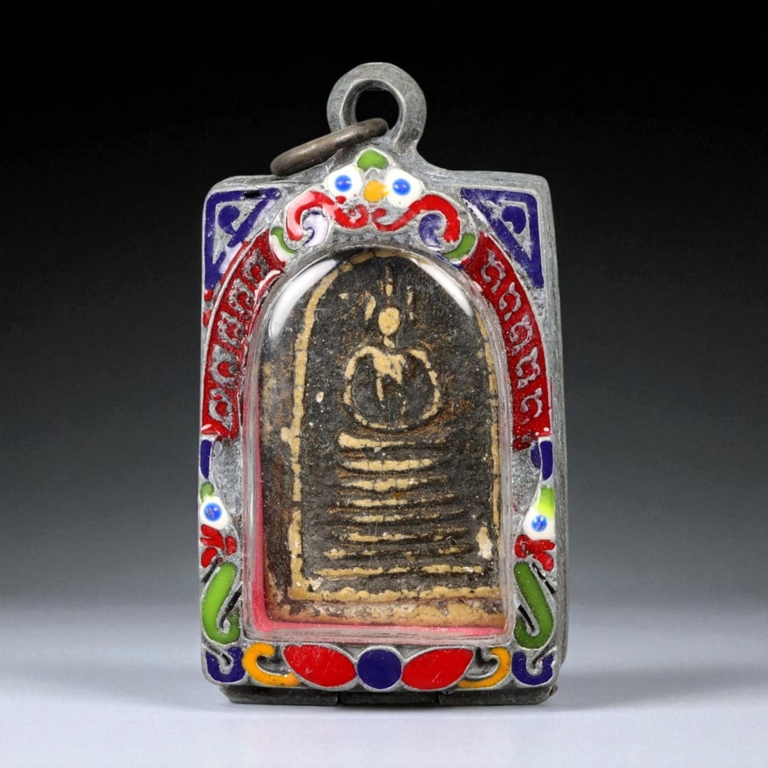 Vintage Thai Buddhist Amulet in Ornate Framed Setting, 20th Century, 6cm: This vintage Thai Buddhist amulet exemplifies the devotional artistry that continues to define Thailand's sacred craftsmanship. Encased within an intricately detailed frame, the amulet displays refine