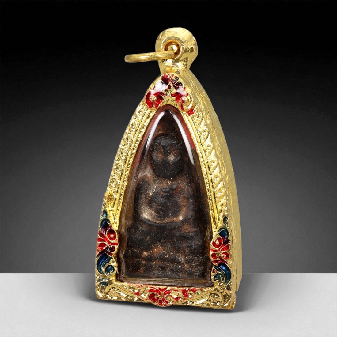 Thai Temple Gilt Buddhist Amulet in Ornate Gold-Tone Frame, 6cm: This beautifully crafted gilt Buddhist amulet is enclosed within an intricately designed gold-tone frame, combining sacred symbolism with refined artistry. The detailed relief and lustrous finish refl