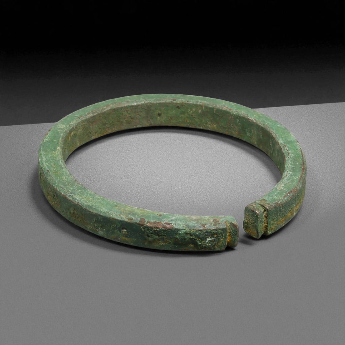 Ancient Roman Bronze Bracelet, c. 1st-3rd Century CE, 10cm, 165g: This ancient Roman bronze bracelet dates to the height of the Roman Empire, between the 1st and 3rd centuries CE, a time of expansive trade, engineering marvels, and refined metal craftsmanship. Bronz