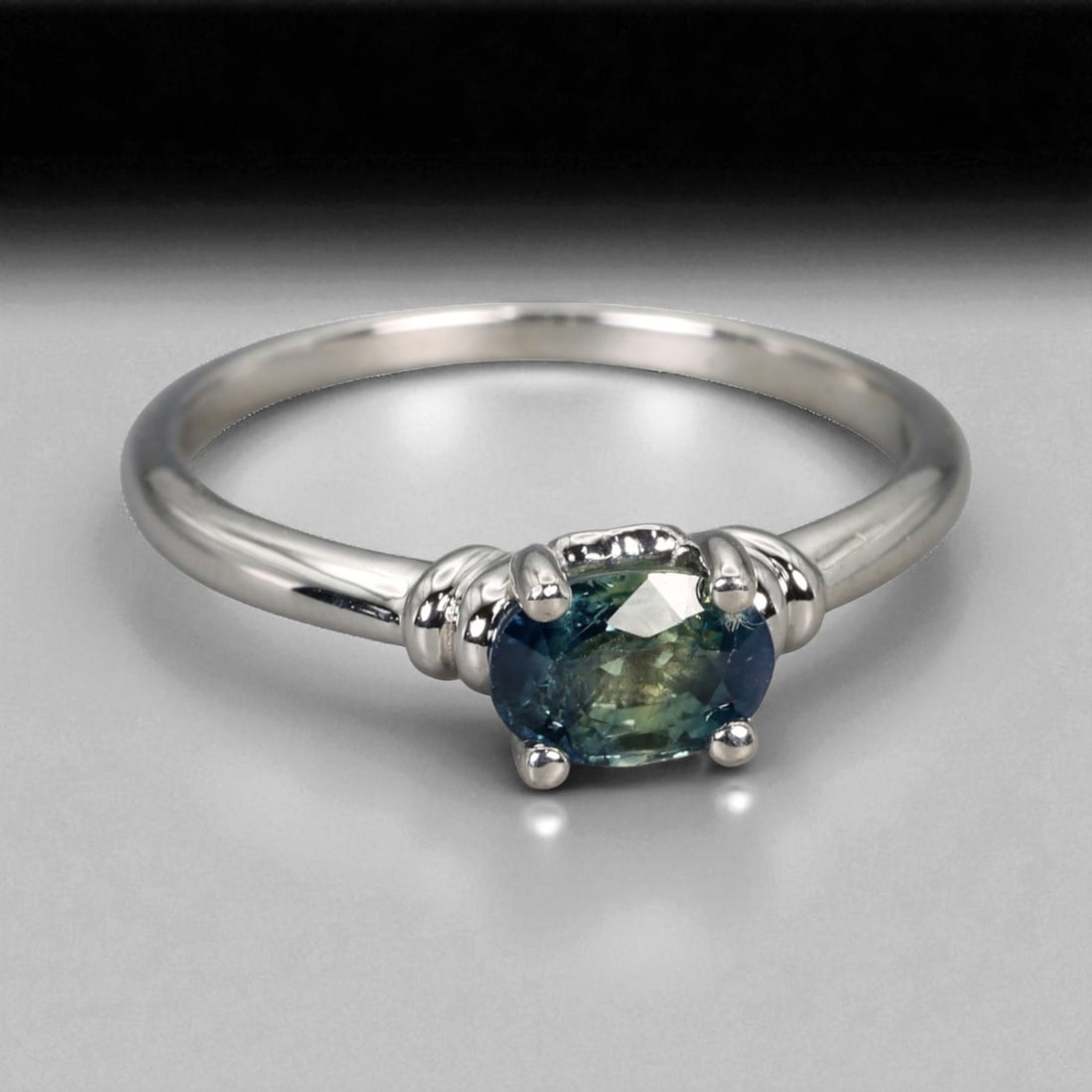 Twilight Knot Pattern 925 Silver Ring with Natural Parti Sapphire, 7.75 US: This refined 925 silver ring showcases the "Twilight Knot" pattern - a minimalist yet captivating design defined by its graceful balance and subtle symbolism. At its center rests an oval-cut natural p