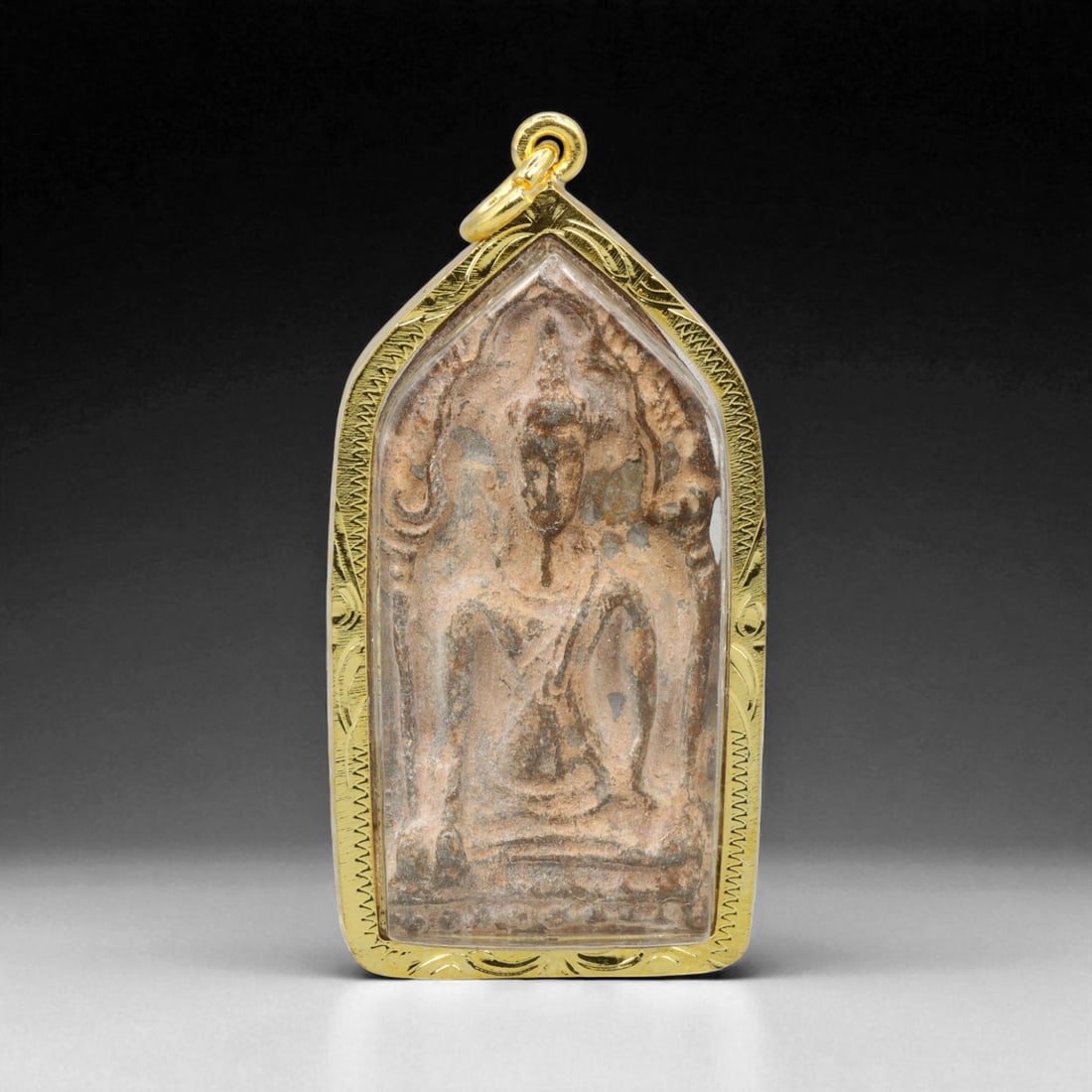 Thai Temple Gilt Buddhist Amulet in Ornate Gold-Tone Frame, 6cm: This beautifully crafted gilt Buddhist amulet is enclosed within an intricately designed gold-tone frame, combining sacred symbolism with refined artistry. The detailed relief and lustrous finish refl