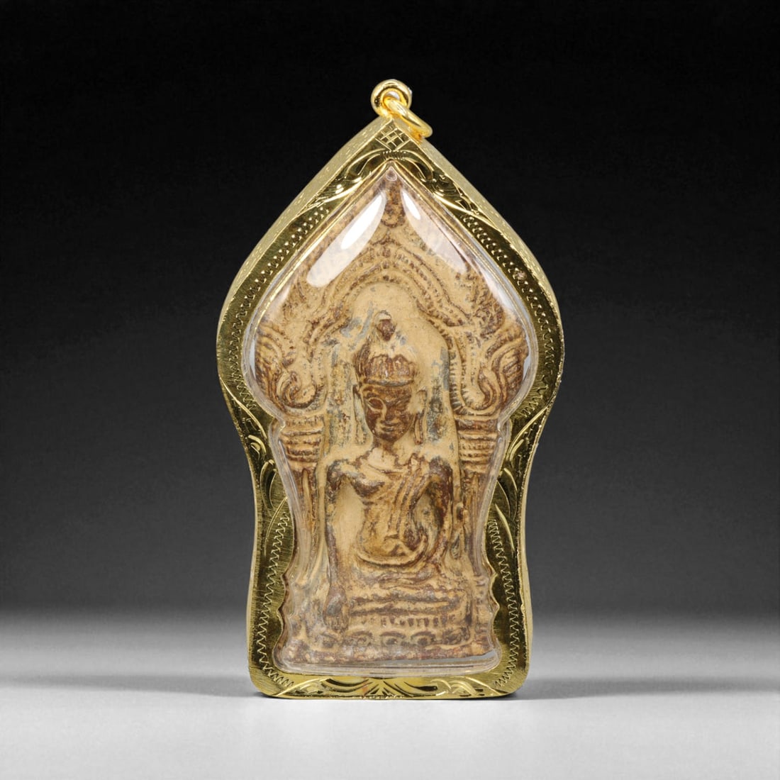 Thai Temple Gilt Buddhist Amulet in Ornate Gold-Tone Frame, 8.5cm: This beautifully crafted gilt Buddhist amulet is enclosed within an intricately designed gold-tone frame, combining sacred symbolism with refined artistry. The detailed relief and lustrous finish refl