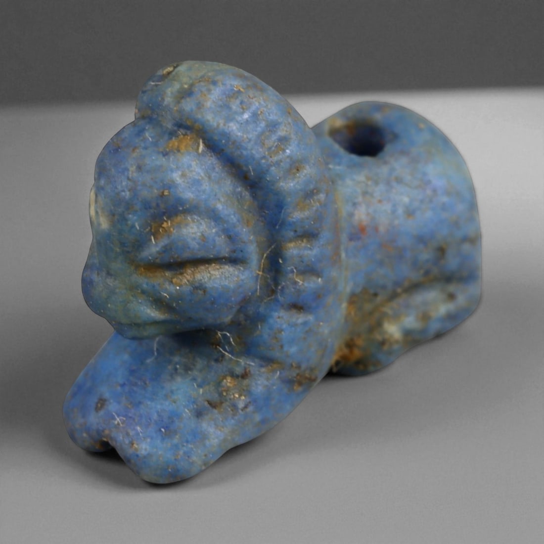 Ancient Bactrian Lapis Lazuli Feline Amulet, c. 3rd-2nd Millennium BCE, 1.5cm, 4g: This finely carved feline amulet, crafted from deep blue lapis lazuli. It originates from Bactria (ancient Afghanistan, c. 2300-1700 BCE), a region celebrated for its lapidary artistry and as the worl
