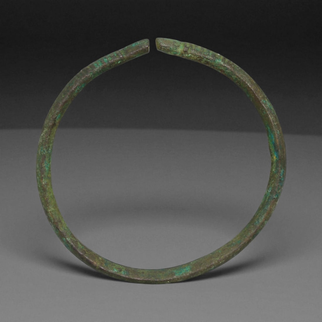 Ancient Roman Bronze Bracelet, c. 1st-3rd Century CE, 6cm, 22g: This ancient Roman bronze bracelet dates to the height of the Roman Empire, between the 1st and 3rd centuries CE, a time of expansive trade, engineering marvels, and refined metal craftsmanship. Bronz