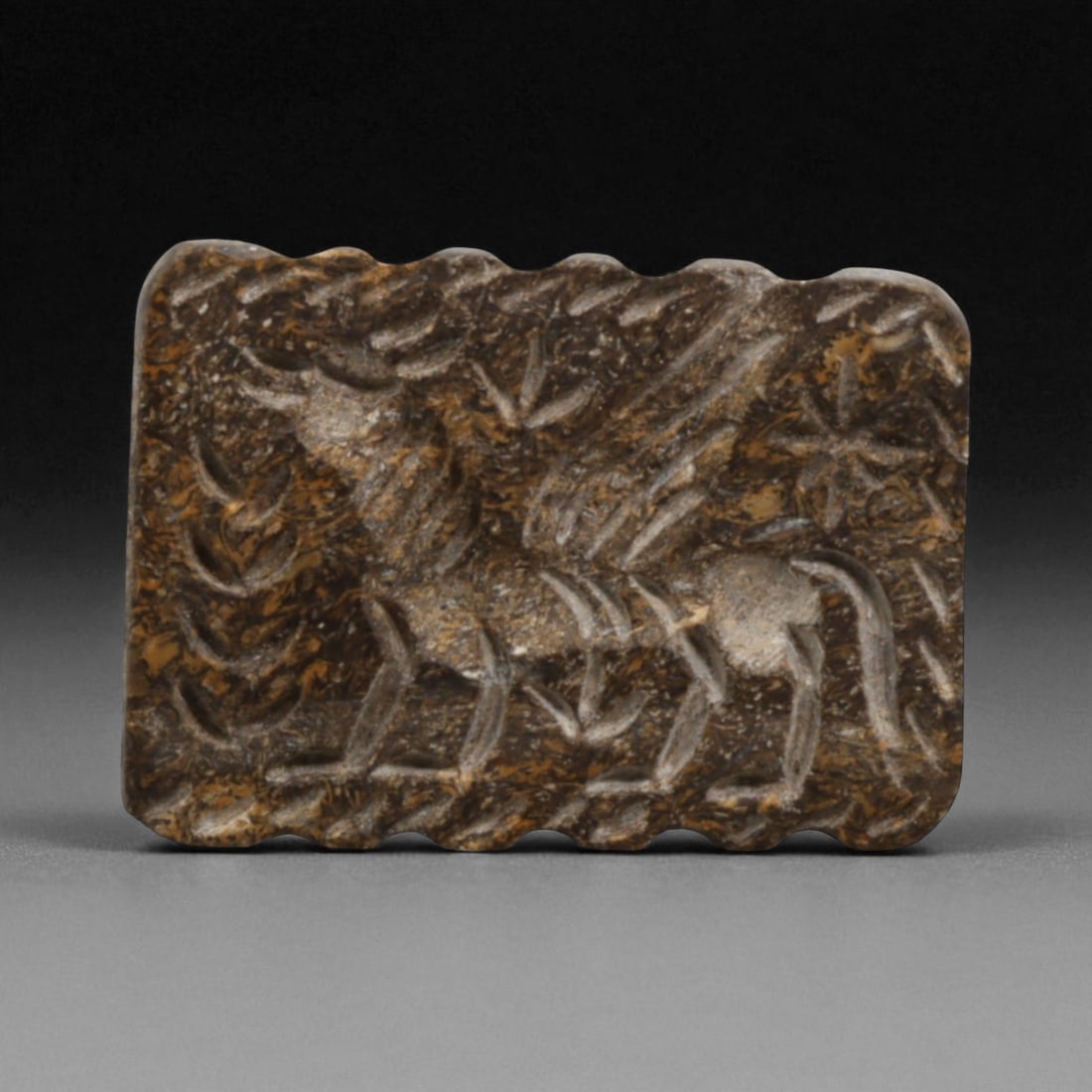 Ancient Sasanian Winged Griffin Stamp Seal Bead, c. 3rd-6th Century CE 28g: This powerful rectangular stamp seal bead, carved during the height of the Sasanian Empire (224-651 CE), embodies the sophistication and symbolism of one of antiquity's greatest dynasties. Measuring 3