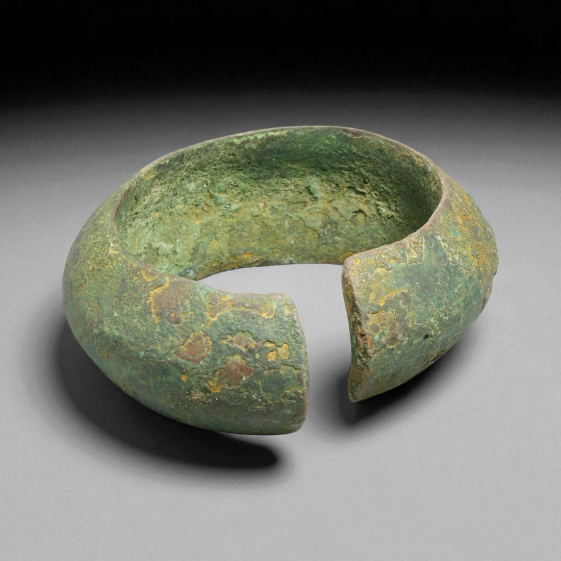 Ancient Roman Bronze Bracelet, c. 1st-3rd Century CE, 8cm, 283g: This ancient Roman bronze bracelet dates to the height of the Roman Empire, between the 1st and 3rd centuries CE, a time of expansive trade, engineering marvels, and refined metal craftsmanship. Bronz
