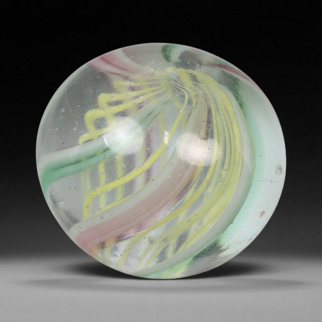 Vintage German Handmade Glass Swirl Marble, c. Early-Mid 20th Century, 17 mm: This vintage German handmade glass marble represents the golden era of European glass artistry, where precision craftsmanship and vibrant color blending elevated even simple play objects into collecti
