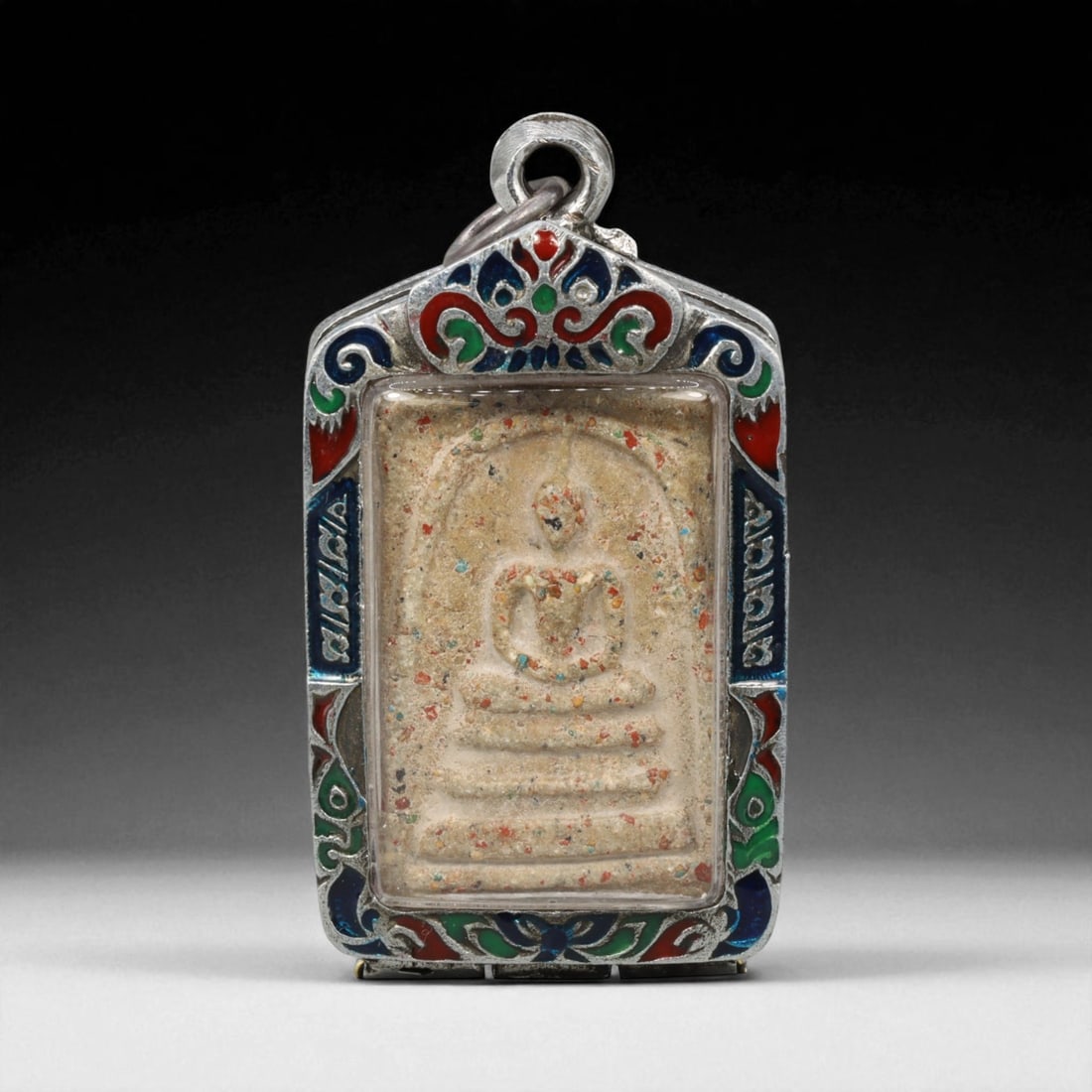 Vintage Thai Buddhist Amulet in Ornate Framed Setting, 20th Century , 6cm: This vintage Thai Buddhist amulet exemplifies the devotional artistry that continues to define Thailand's sacred craftsmanship. Encased within an intricately detailed frame, the amulet displays refine