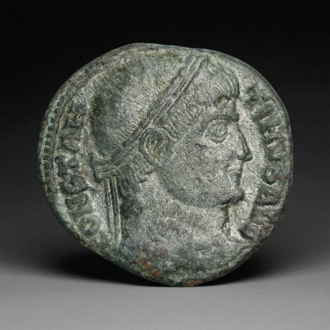 ROMAN EMPIRE: Imperial Authority - Bronze Coin, c. 1st-3rd Century AD, 18mm: Struck during the turbulent decades of the later Roman Empire, this 19mm bronze coin reflects the enduring symbolism of imperial control amidst crisis. Its compact yet deliberate design likely feature
