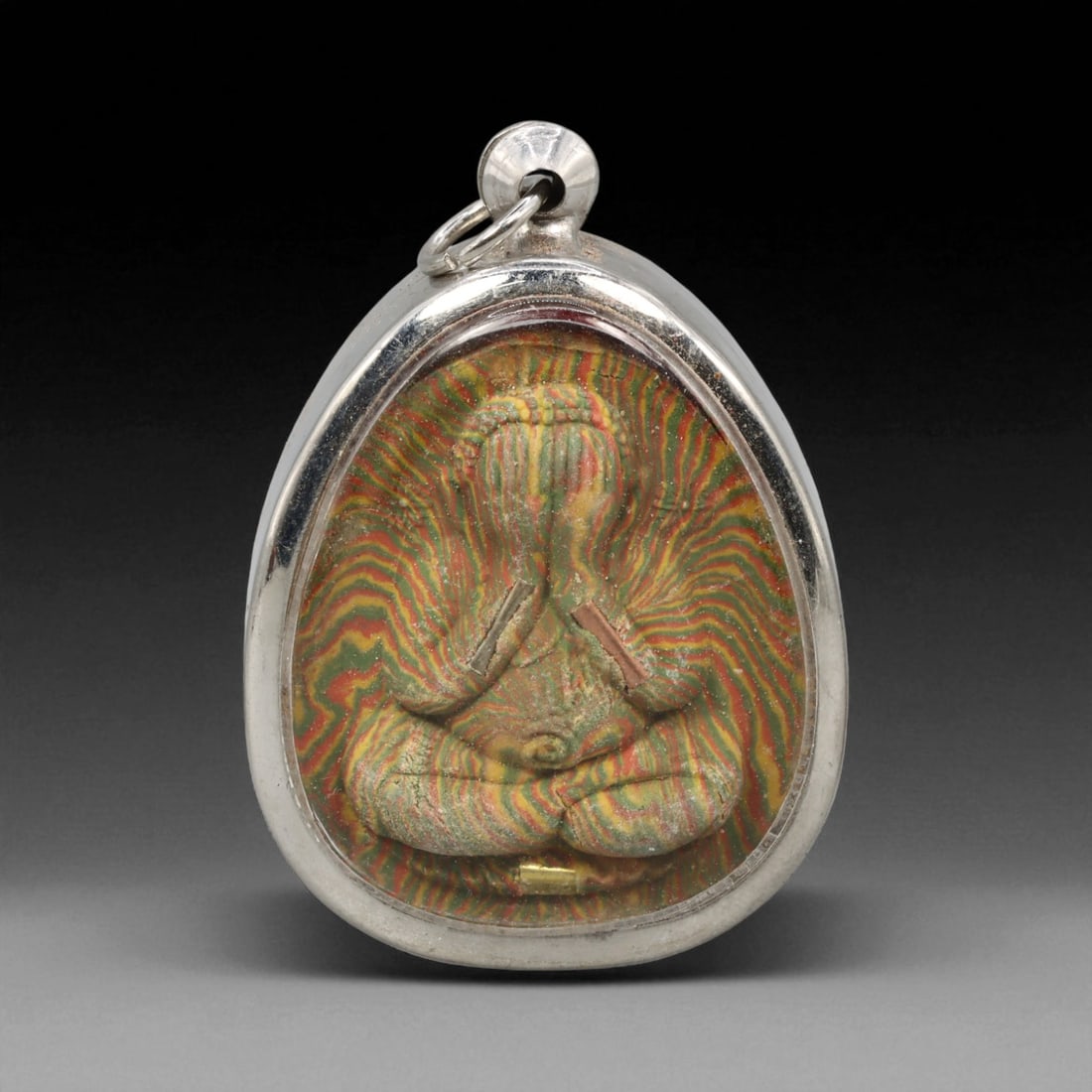 Vintage Thai Buddhist Amulet in Ornate Framed Setting, 20th Century , 5cm: This vintage Thai Buddhist amulet exemplifies the devotional artistry that continues to define Thailand's sacred craftsmanship. Encased within an intricately detailed frame, the amulet displays refine