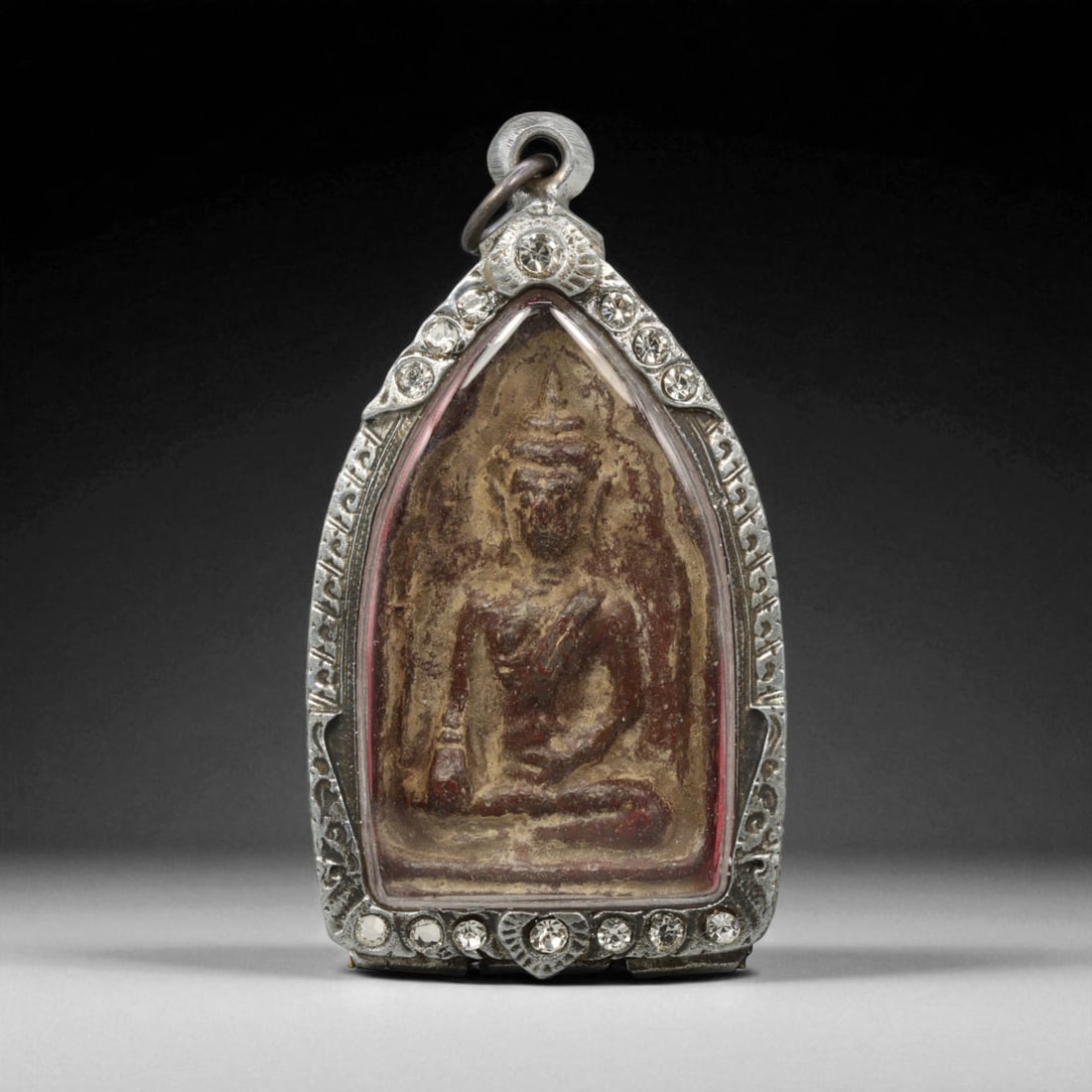 Vintage Thai Buddhist Amulet in Ornate Framed Setting, 20th Century , 6.5cm: This vintage Thai Buddhist amulet exemplifies the devotional artistry that continues to define Thailand's sacred craftsmanship. Encased within an intricately detailed frame, the amulet displays refine