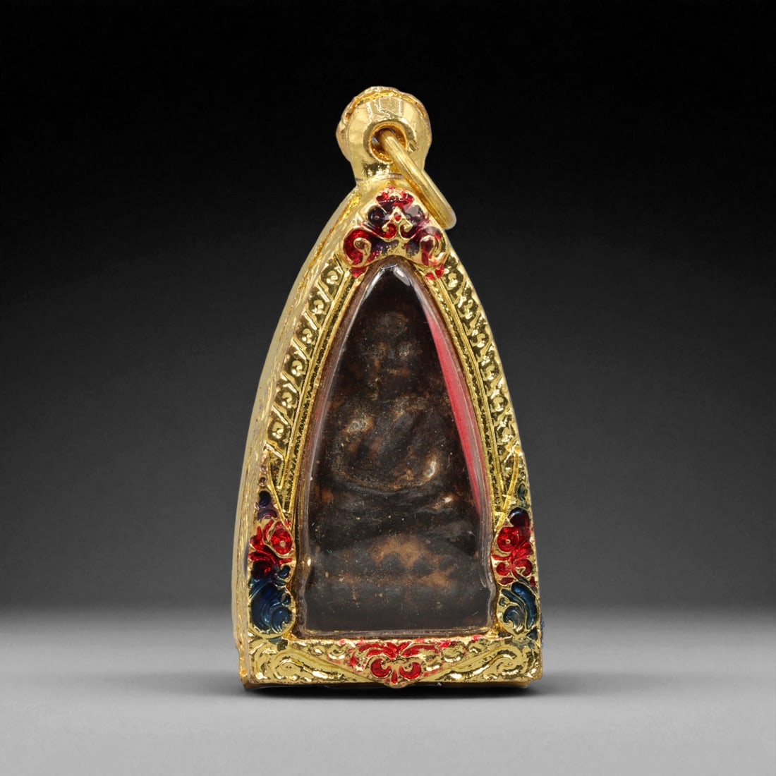 Thai Temple Style Gilt Buddhist Amulet in Ornate Gold-Tone Frame, 5.5cm: This beautifully crafted gilt Buddhist amulet is enclosed within an intricately designed gold-tone frame, combining sacred symbolism with refined artistry. The detailed relief and lustrous finish refl