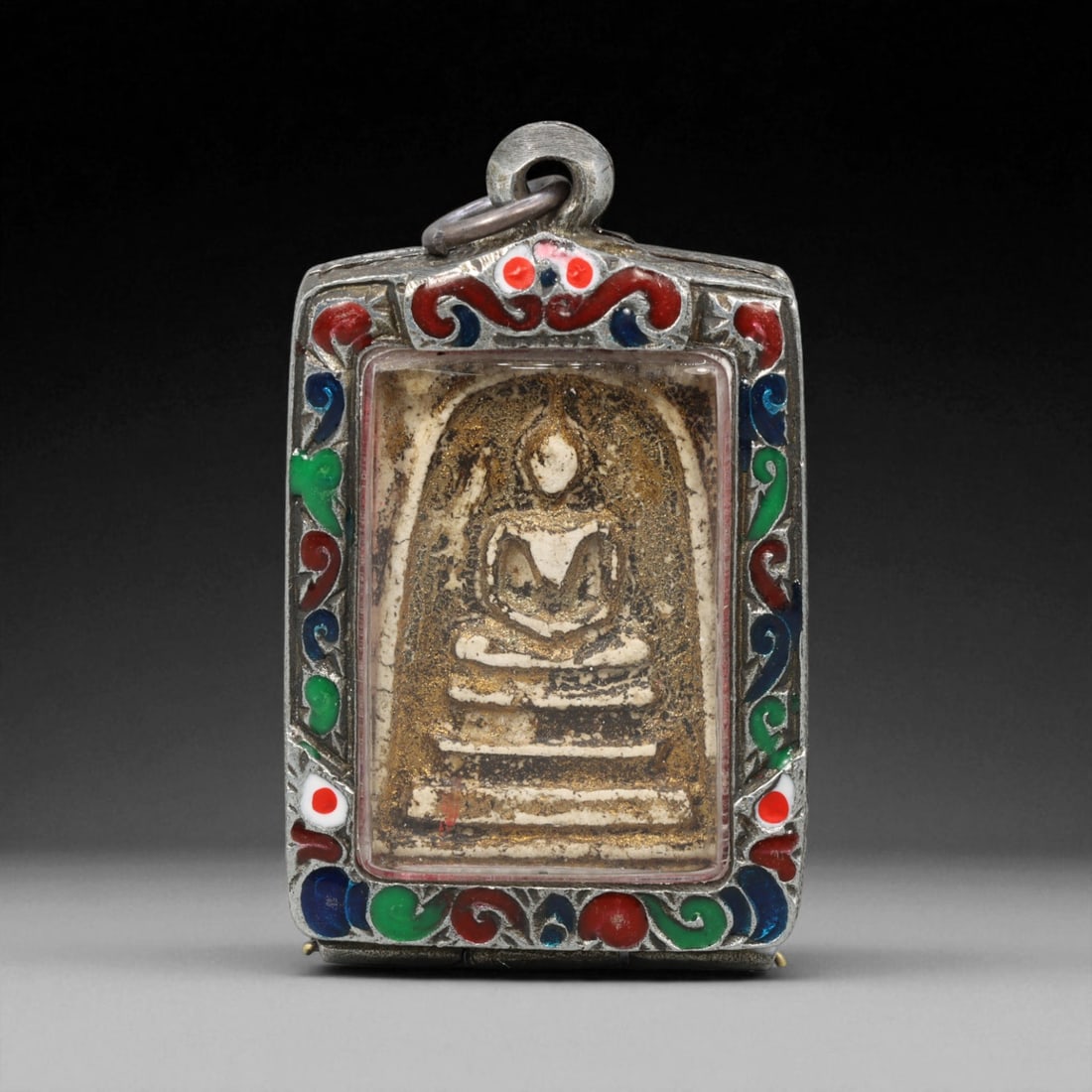 Vintage Thai Buddhist Amulet in Ornate Framed Setting, 20th Century , 5.5cm: This vintage Thai Buddhist amulet exemplifies the devotional artistry that continues to define Thailand's sacred craftsmanship. Encased within an intricately detailed frame, the amulet displays refine