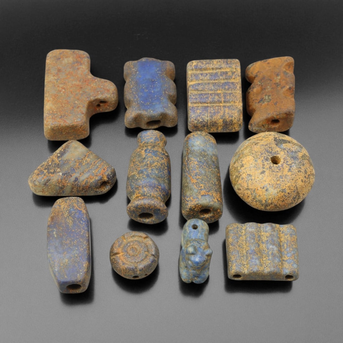 Ancient Bactrian Lapis Lazuli Beads, c. 2nd Millennium BCE, 1-2cm: This exceptional grouping of ancient Bactrian lapis lazuli beads, dating to the 2nd millennium BCE, represents the height of early Central Asian lapidary craftsmanship. Mined from the fabled deposits 