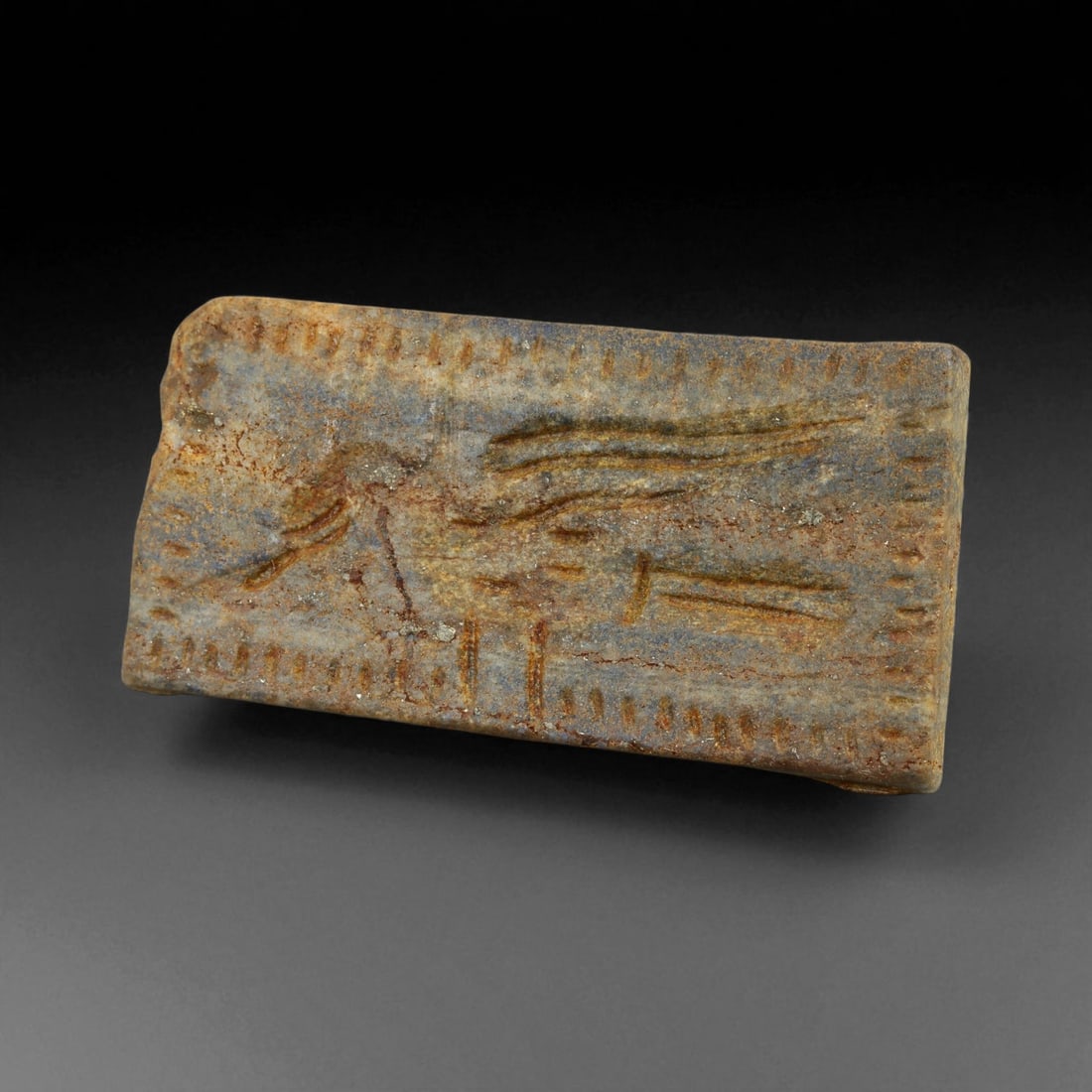 Ancient Neo-Assyrian Lapis Lazuli Vulture Motif Amulet, c. 9th-7th Century BCE 44g: This imposing amulet, carved from vibrant lapis lazuli, dates to the Neo-Assyrian Empire, one of the most formidable powers of the ancient Near East. Measuring an impressive 7 cm and weighing 44 g, it