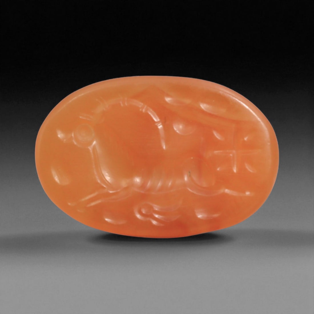 Ancient Sasanian Carnelian Intaglio with Engraving Motif, 1.6cm, 1g: This carnelian intaglio, finely engraved into the warm red tones of semi-precious stone, reflects a tradition of craftsmanship spanning from the classical world to the early modern era. Intaglios serv