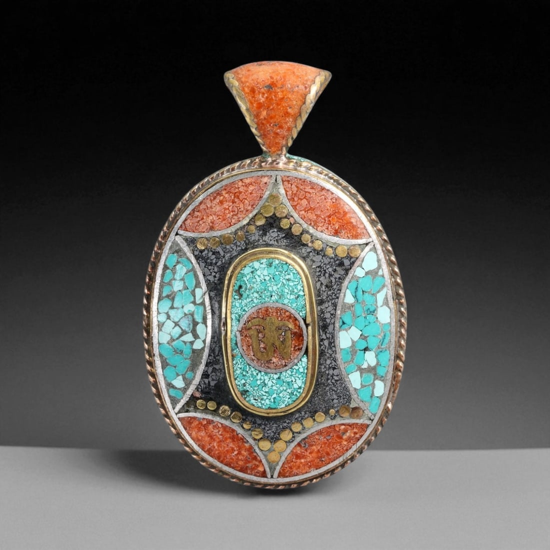 Vintage Himalayan Turquoise Coral Mosaic Silver Pendant, 20th Century, 5.4cm: This vintage Himalayan pendant features an elegant oval form with intricate mosaic inlays of turquoise and coral framed in silver. The design is divided into harmonious geometric panels, each filled w