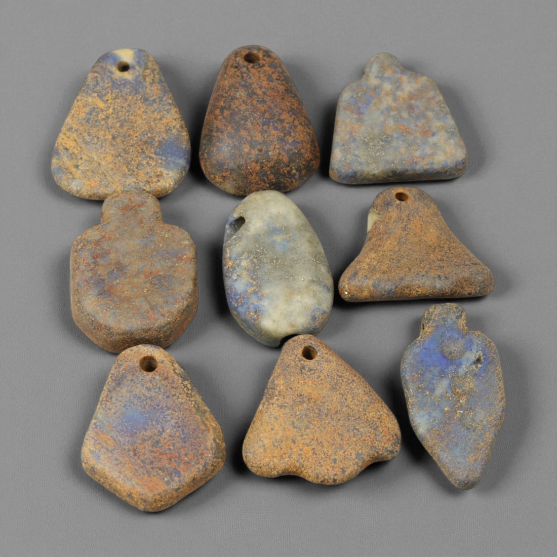 Ancient Bactrian Lapis Lazuli Beads, c. 2nd Millennium BCE, 2-2.4cm: These ancient Bactrian lapis lazuli beads, dating to the 2nd millennium BCE, originate from the storied region of Bactria - a crossroads of civilizations stretching across present-day northern Afghani