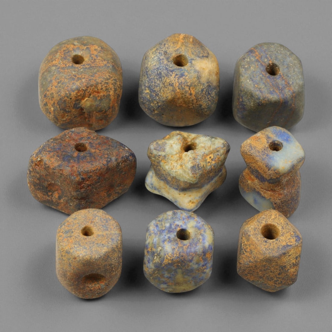 Ancient Bactrian Lapis Lazuli Beads, c. 2nd Millennium BCE, 1.2-1.6cm: This remarkable set of ancient Bactrian lapis lazuli beads, dating to the 2nd millennium BCE, exemplifies the refined artistry and symbolic depth of early Central Asian craftsmanship. Sourced from the