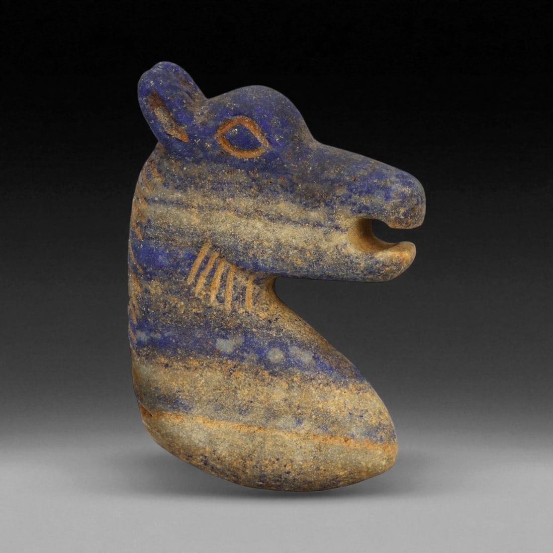 Ancient Bactrian Lapis Lazuli Horse Bust Amulet, c. 2nd-1st Millennium BCE, 6.5cm: This finely sculpted lapis lazuli effigy of a horse's head originates from ancient Bactria, circa 2nd-1st millennium BCE - a civilization that flourished across modern northern Afghanistan and souther