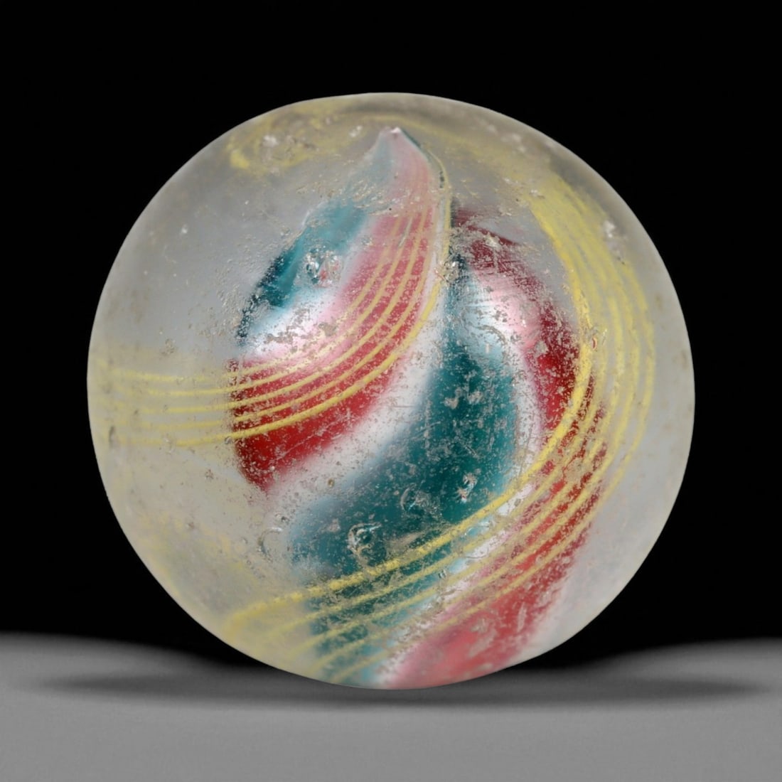 Vintage German Handmade Glass Swirl Marble, c. Early-Mid 20th Century, 17 mm: This vintage German handmade glass marble represents the golden era of European glass artistry, where precision craftsmanship and vibrant color blending elevated even simple play objects into collecti
