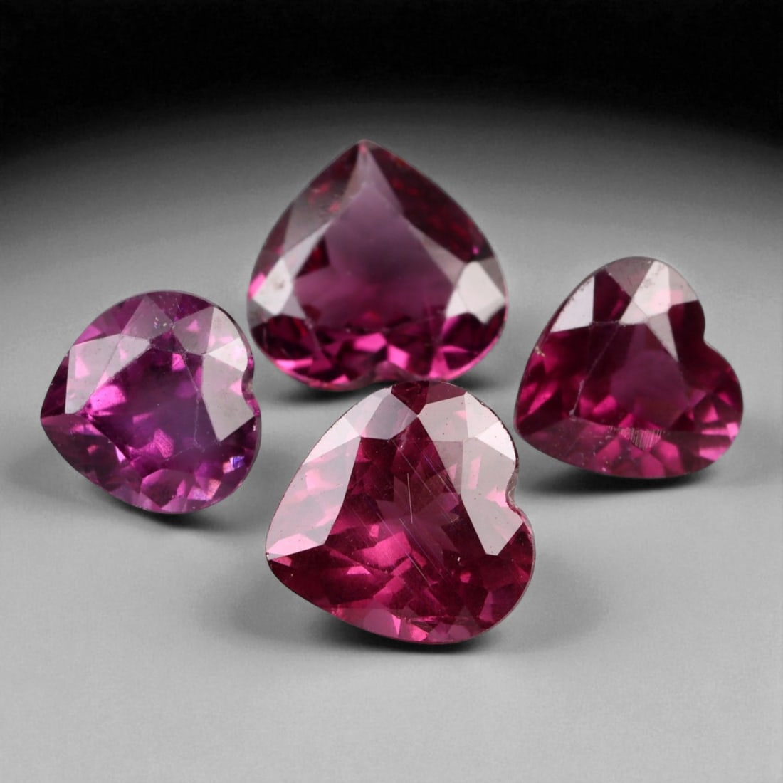 4.58 Carats Deep Red Faceted Garnet Parcel - Natural Mozambique Stones: This richly colored parcel of faceted garnets glows with a deep crimson tone accented by flashes of wine-red brilliance. Each heart gem, averaging 6x2 mm, captures light with elegant depth and interna