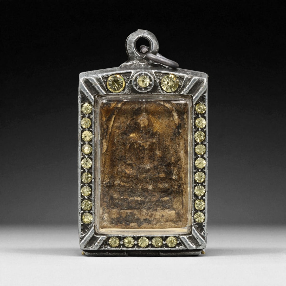 Vintage Thai Buddhist Amulet in Ornate Framed Setting, 20th Century , 5.5cm: This vintage Thai Buddhist amulet exemplifies the devotional artistry that continues to define Thailand's sacred craftsmanship. Encased within an intricately detailed frame, the amulet displays refine