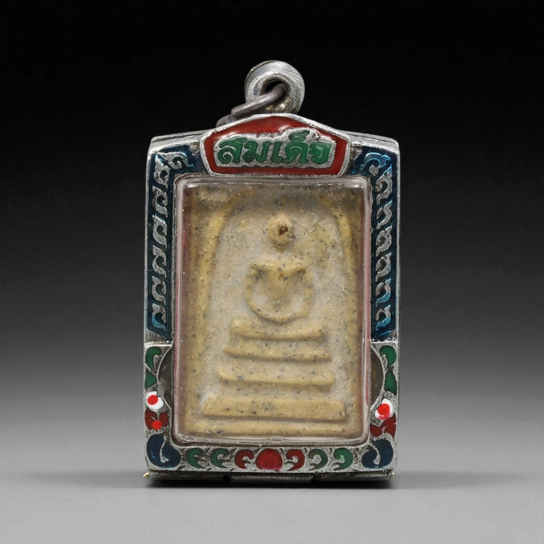 Vintage Thai Buddhist Amulet in Ornate Framed Setting, 20th Century , 5.5cm: This vintage Thai Buddhist amulet exemplifies the devotional artistry that continues to define Thailand's sacred craftsmanship. Encased within an intricately detailed frame, the amulet displays refine