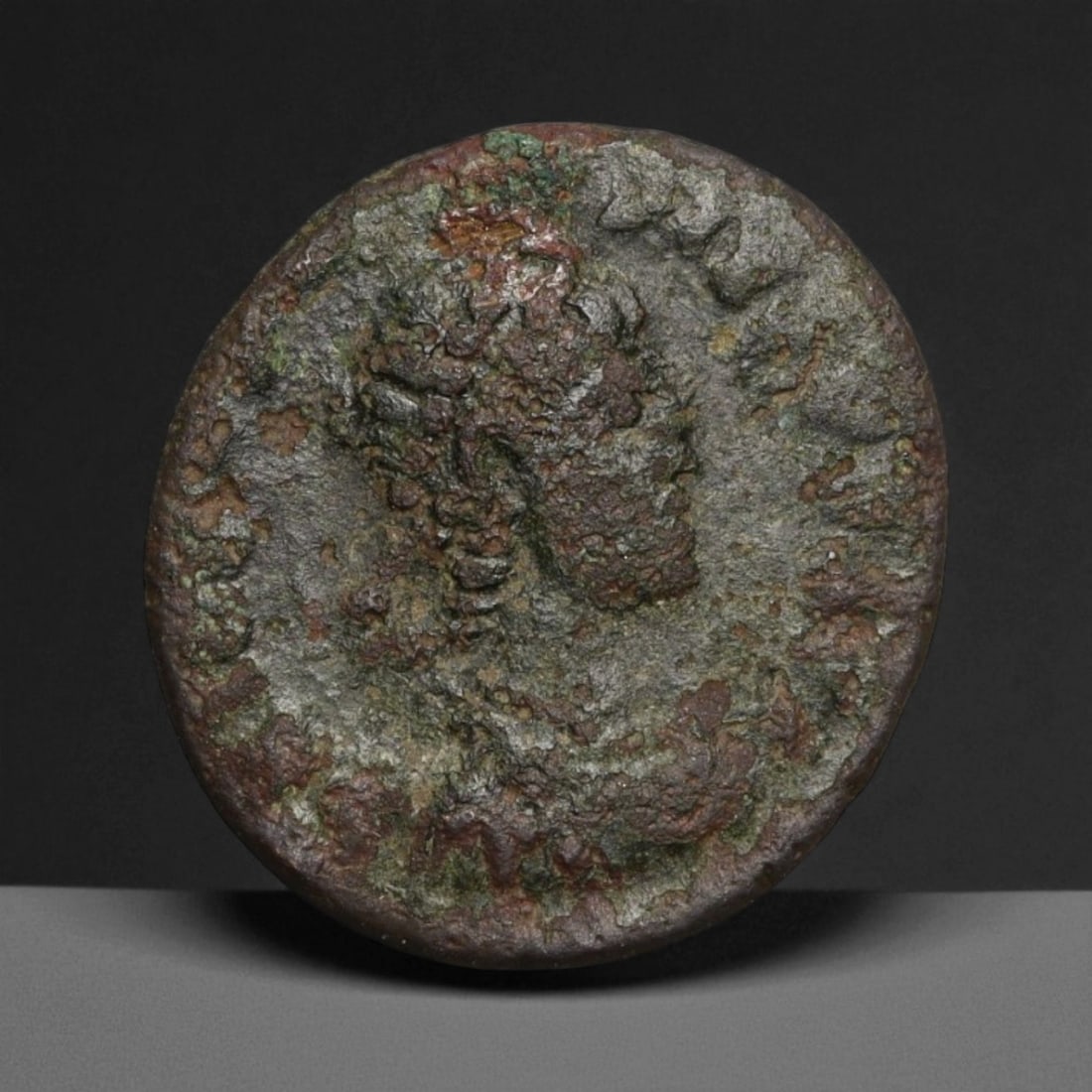 ROMAN EMPIRE: Imperial Authority - Bronze Coin, c. 1st-3rd Century AD, 13mm: Struck during the turbulent decades of the later Roman Empire, this 19mm bronze coin reflects the enduring symbolism of imperial control amidst crisis. Its compact yet deliberate design likely feature
