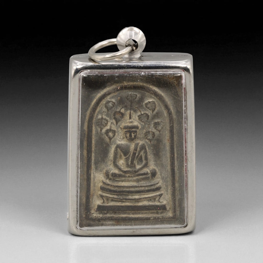 Vintage Thai Buddhist Amulet in Ornate Framed Setting, 20th Century , 4.5cm: This vintage Thai Buddhist amulet exemplifies the devotional artistry that continues to define Thailand's sacred craftsmanship. Encased within an intricately detailed frame, the amulet displays refine