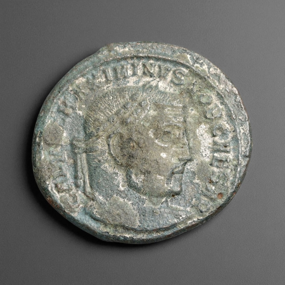 ROMAN EMPIRE: Imperial Authority - Bronze Coin, c. 1st-3rd Century AD, 27mm: Struck during the turbulent decades of the later Roman Empire, this 19mm bronze coin reflects the enduring symbolism of imperial control amidst crisis. Its compact yet deliberate design likely feature