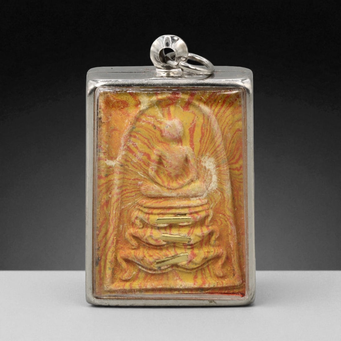 Vintage Thai Buddhist Amulet in Ornate Framed Setting, 20th Century , 4cm: This vintage Thai Buddhist amulet exemplifies the devotional artistry that continues to define Thailand's sacred craftsmanship. Encased within an intricately detailed frame, the amulet displays refine