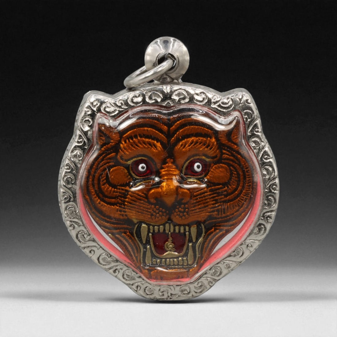 Vintage Thai Buddhist Amulet in Ornate Framed Setting, 20th Century , 4cm: This vintage Thai Buddhist amulet exemplifies the devotional artistry that continues to define Thailand's sacred craftsmanship. Encased within an intricately detailed frame, the amulet displays refine