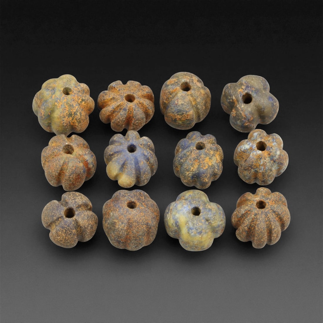 Ancient Persian Banded Agate Barrel Beads, c. 5th-3rd Century BCE, 3-3.8cm: These elegant ancient Persian agate beads date to the Achaemenid to early Parthian period, circa 5th-3rd century BCE. Expertly shaped into elongated barrel forms, each bead displays the natural bandin