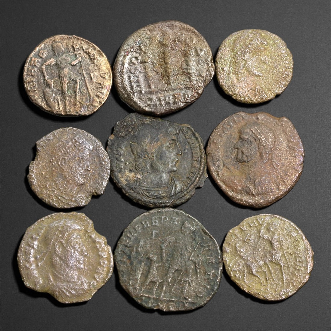 Ancient Roman Imperial Bronze Coins, 9 Pieces, c. 3rd-4th Century CE, 15-21mm: This group of ancient Roman bronze coins dates to the 3rd-4th century CE, a period marked by both artistic refinement and political transformation within the late Empire. Each coin bears portraits of 