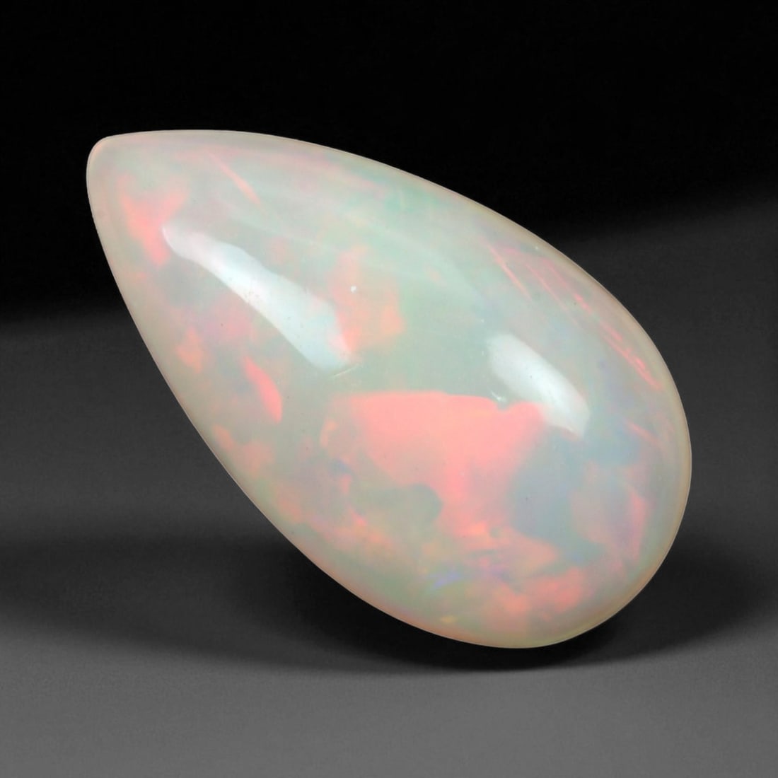 3.16 Carats Multi-Color Welo Opal Lot - Natural Ethiopian Stones: This radiant group of Welo opals displays a mesmerizing interplay of color that dances across the surface with every shift of light. Electric flashes of green, orange, and red ripple through a translu