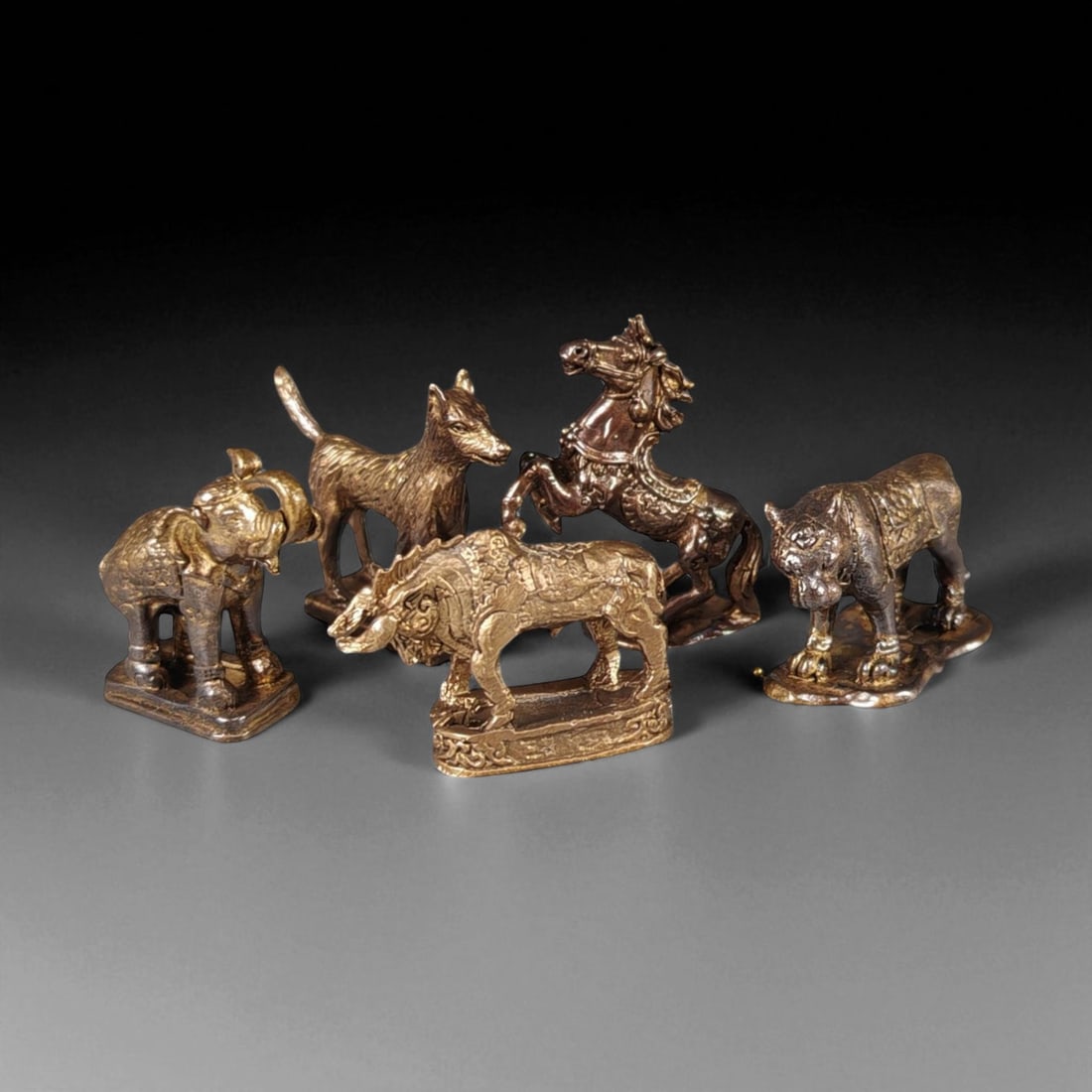 Vintage Thai Brass Zodiac Animal Figurine Set of Five, c. Late 20th Century 2-3cm: This exquisite vintage set of five miniature Thai brass animal figurines, dating from the late 20th century, represents a selection of sacred and auspicious creatures associated with Thai-Buddhist zod