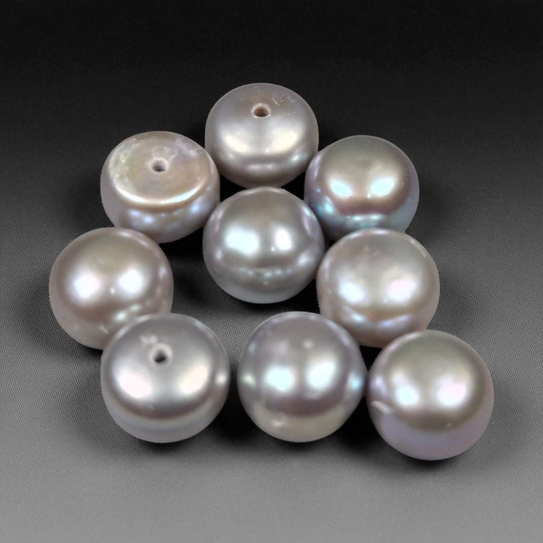 6.50 Grams Silvery Gray Freshwater Pearl Selection - Natural Cultured Lot: This refined grouping of round to semi-round cultured freshwater pearls glows with a sophisticated palette of silvery gray and soft lavender overtones. Each pearl exhibits a lustrous surface with deli
