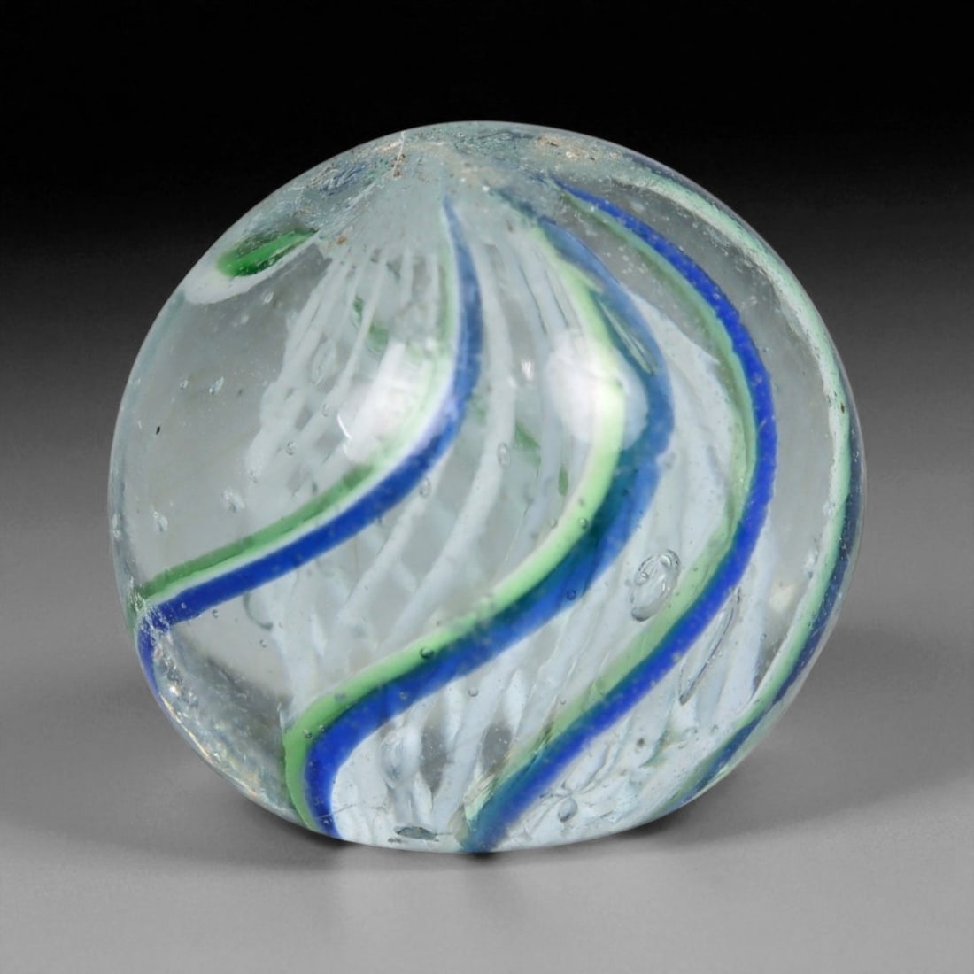 Vintage German Handmade Glass Swirl Marble, c. Early-Mid 20th Century, 14 mm: This vintage German handmade glass marble represents the golden era of European glass artistry, where precision craftsmanship and vibrant color blending elevated even simple play objects into collecti